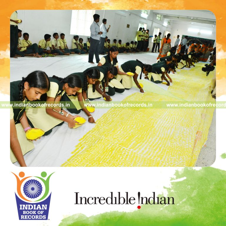 large artwork created using thumbprints by team for Indian Book of Records
