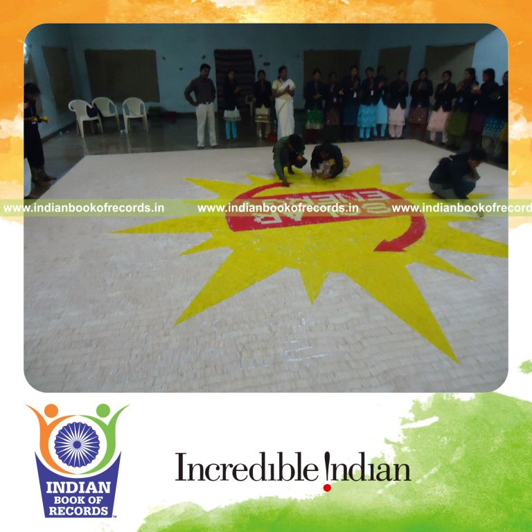 team creating large mosaic artwork using toothpicks for record in Indian Book of Records