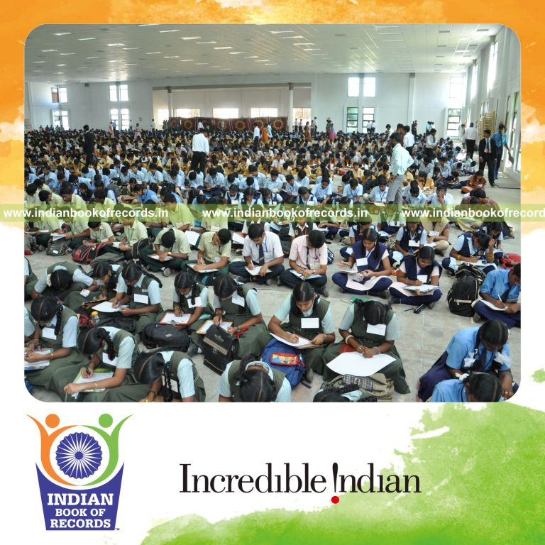 group of participants attending writing competition at single venue for record in Indian Book of Records