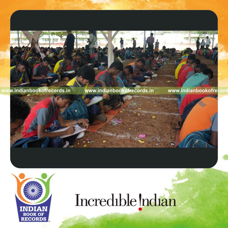 Participants presenting written literature reviews together at one venue for Indian Book of Records