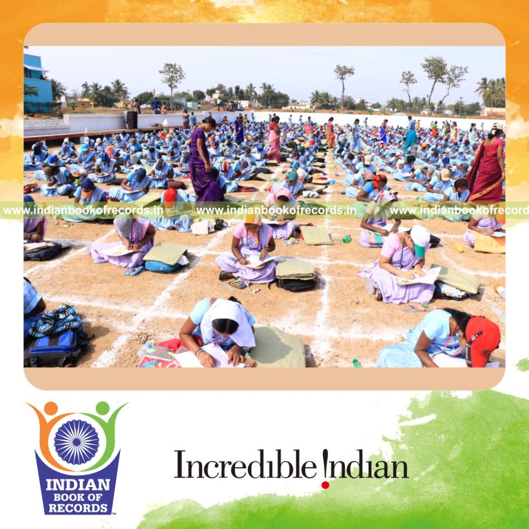 participants colouring logo and writing captions for Indian Book of Records