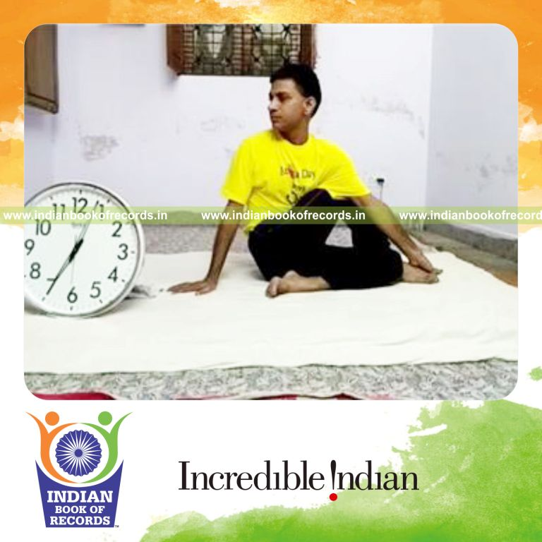 individual holding artha marchenthirasana pose for longest duration for record in Indian Book of Records