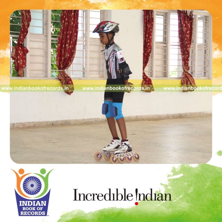 young male performing backward skating marathon for record in Indian Book of Records
