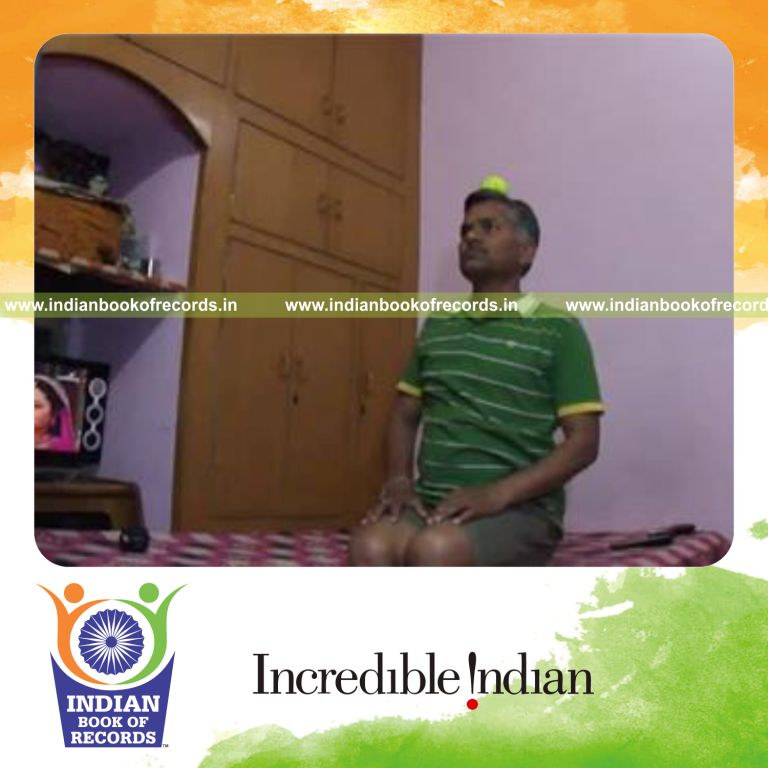 individual balancing cricket ball on head while holding thunderbolt pose for record in Indian Book of Records