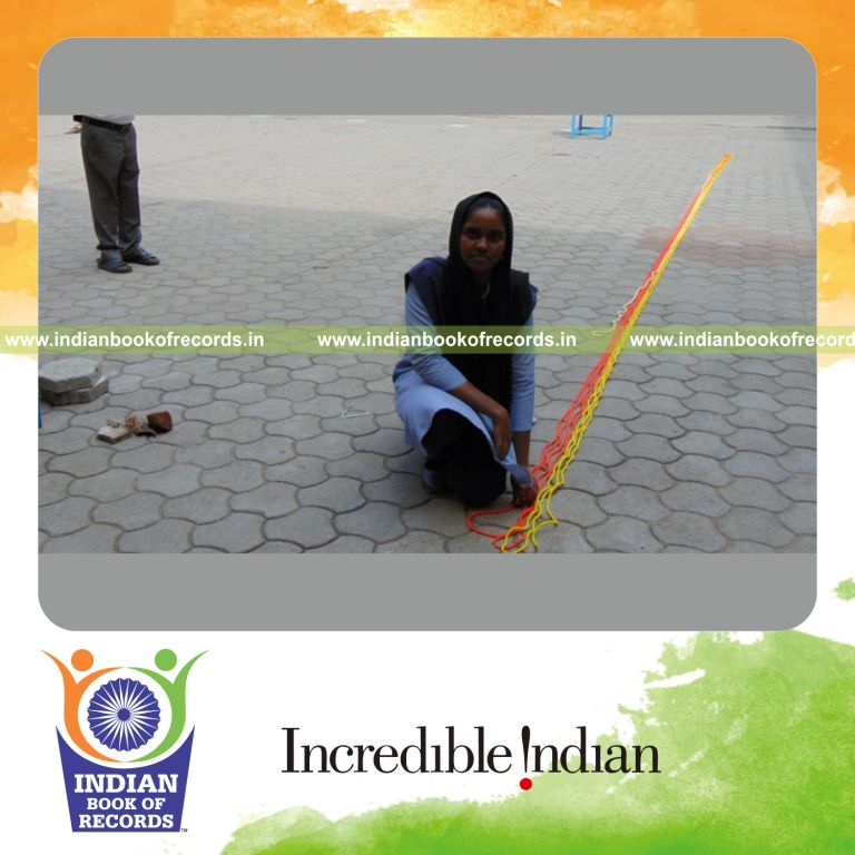 minor female creating long bead string within 4 hours for Indian Book of Records