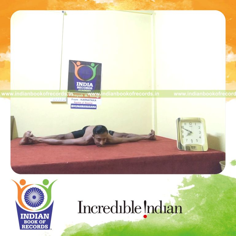 individual male holding bhunamanasana yoga pose for longest duration for record in Indian Book of Records