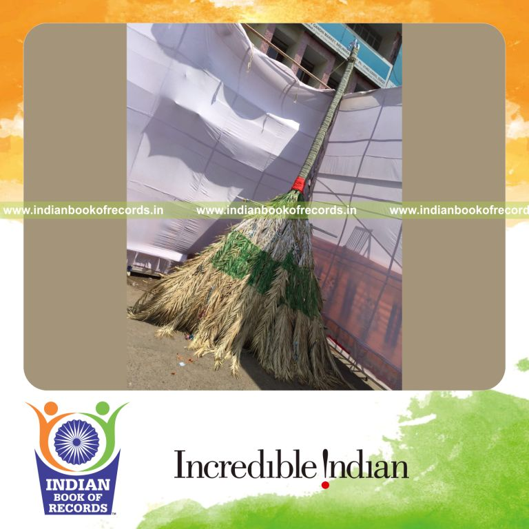 team creating long broom for Indian Book of Records