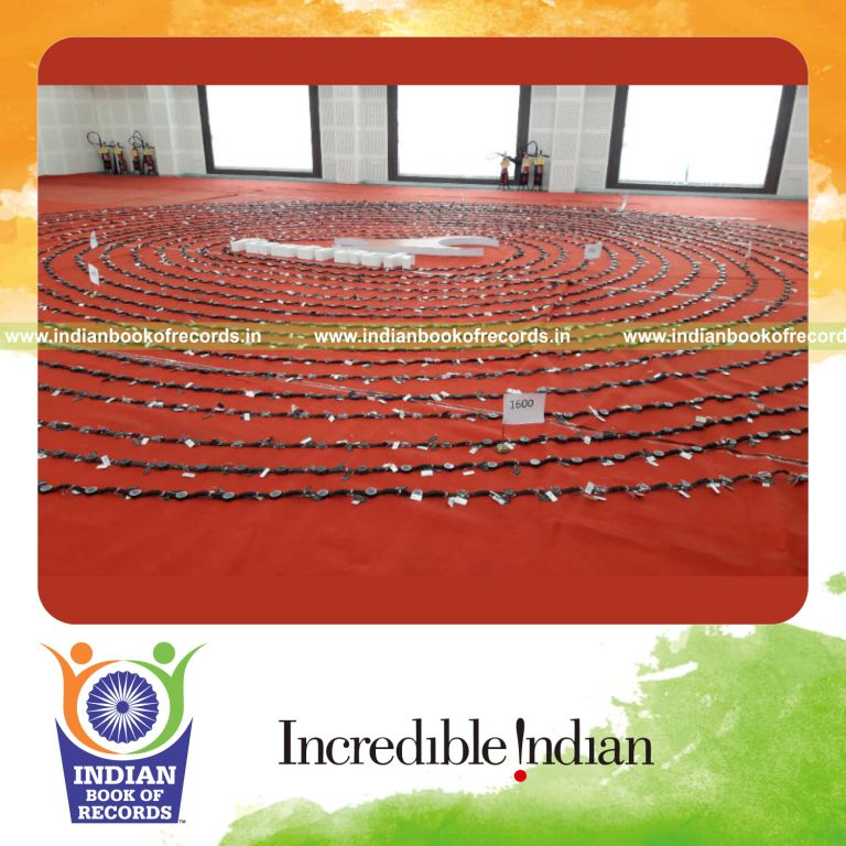 multiple watches connected together to form a continuous chain for a record in Indian Book of Records