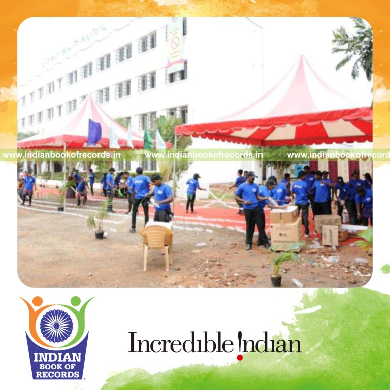 team creating long chain using plastic bottles for Indian Book of Records