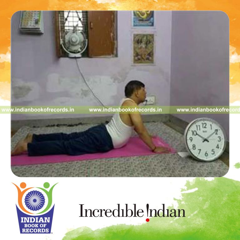 individual holding cobra yoga pose for longest duration for record in Indian Book of Records