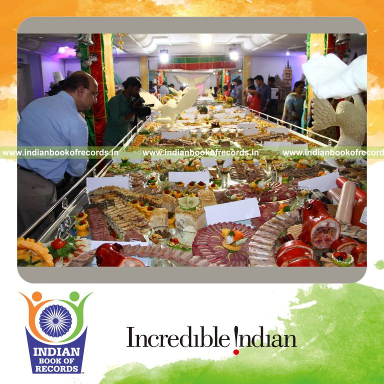team preparing long cold meat platter for Indian Book of Records