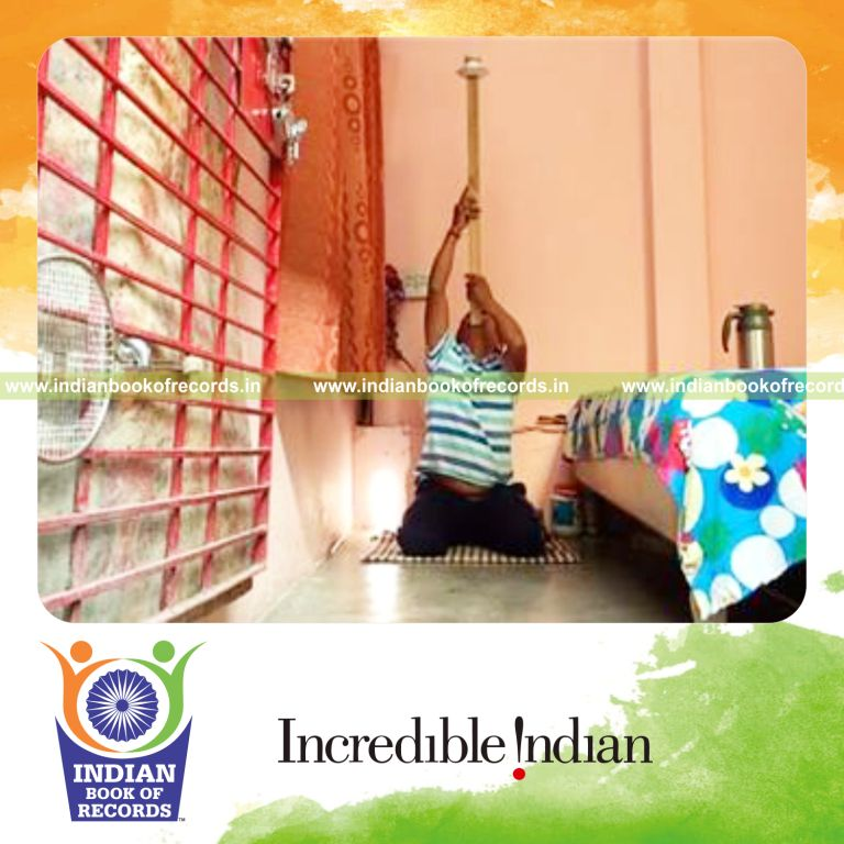 individual balancing cup of tea on chin for longest time for record in Indian Book of Records