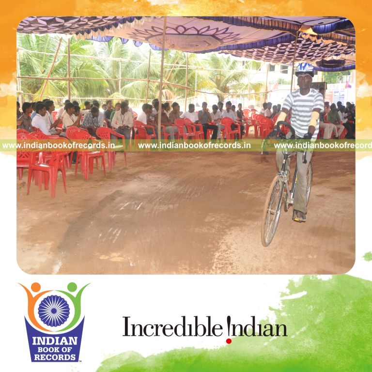 male individual performing extended cycling marathon for record in Indian Book of Records