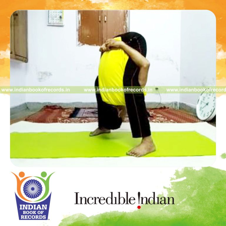 individual holding deep standing forward bend pose for longest time for record in Indian Book of Records