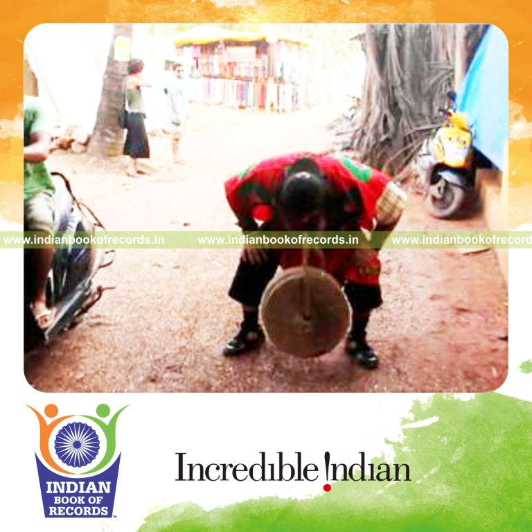 individual hopping longest distance carrying 50kg weight in mouth for record in Indian Book of Records