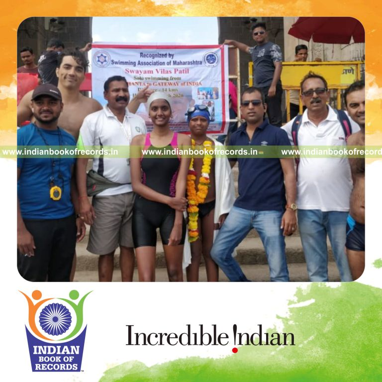 a child with down syndrome swimming a long distance in the sea demonstrating endurance for a record in Indian Book of Records