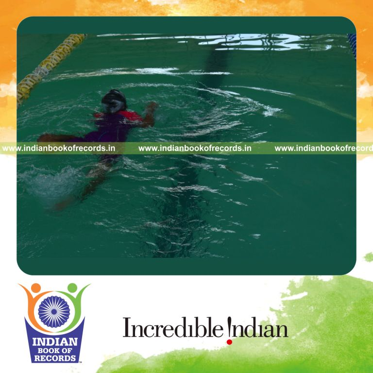 individual minor female swimming longest distance blindfolded with one leg locked for record in Indian Book of Records