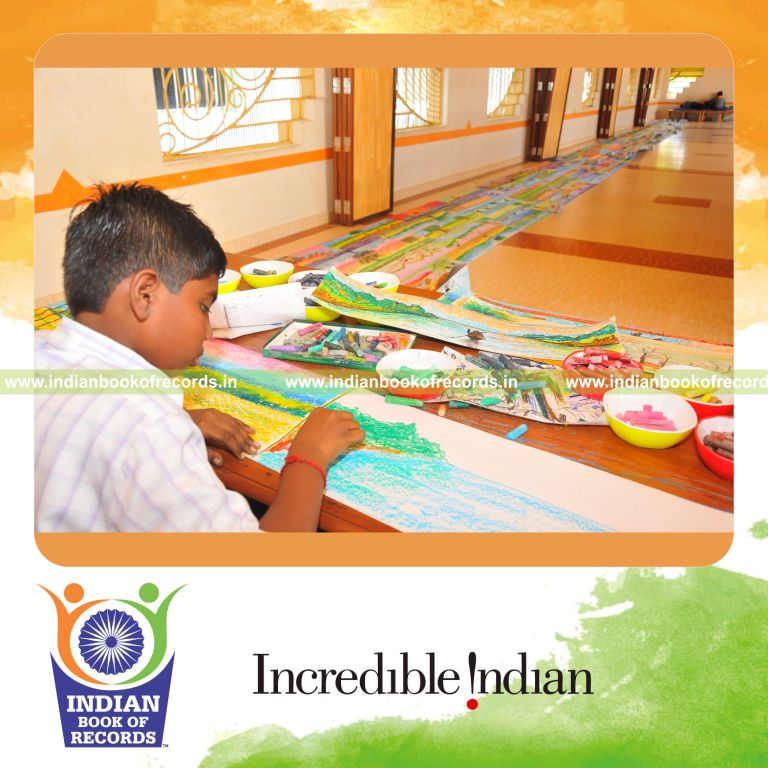 young male creating an extended drawing for record in Indian Book of Records