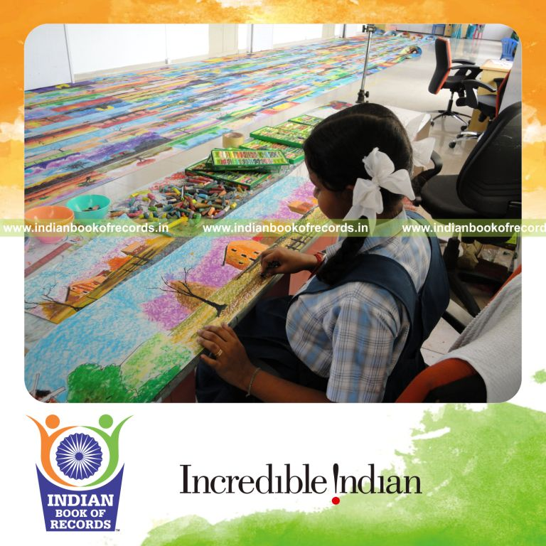 young female drawing continuously in a marathon for record achievement in Indian Book of Records