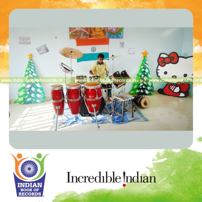 minor male performing long duration drums concert for Indian Book of Records
