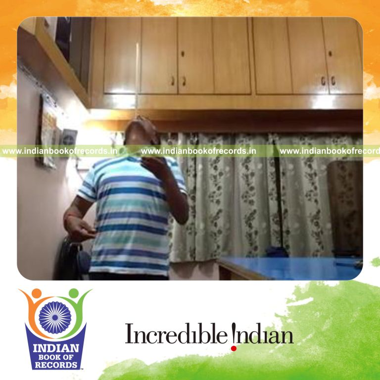 individual balancing drumstick on chin for longest time for record in Indian Book of Records