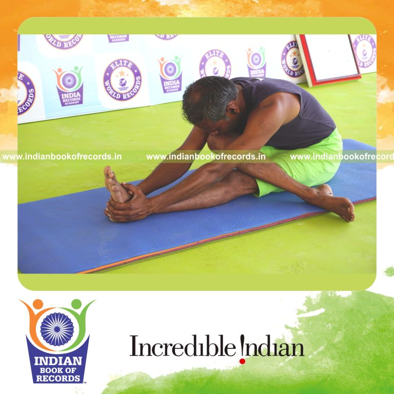 an individual holding daksina ardha janu sirsasana yoga pose for the longest duration with stability for a record in Indian Book of Records