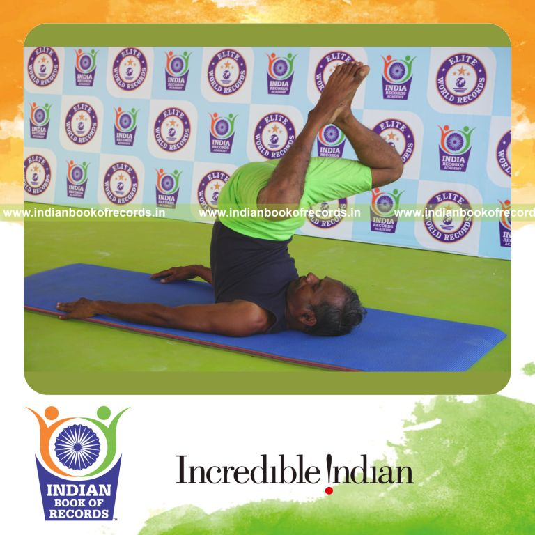 an individual holding baddha salamba sarvangasana yoga pose continuously for the longest duration with strength and stability for a record in Indian Book of Records