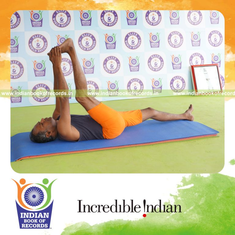 individual holding daksina julasana yoga pose for record in Indian Book of Records