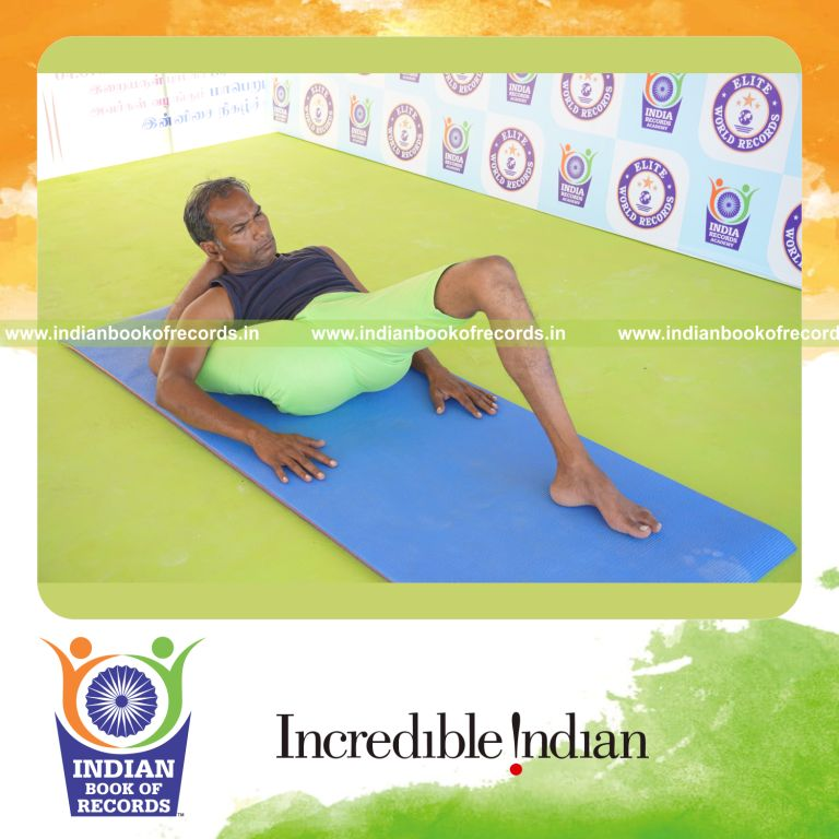 an individual holding daksina kala bhairavasana yoga pose continuously for the longest duration with balance and control for a record in Indian Book of Records