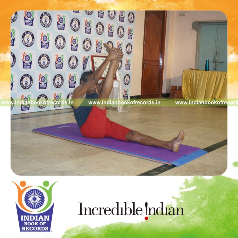 individual holding daksina krounchasana yoga pose for record in Indian Book of Records