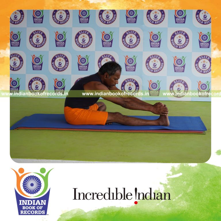 individual holding daksina mahamudra yoga pose for record in Indian Book of Records