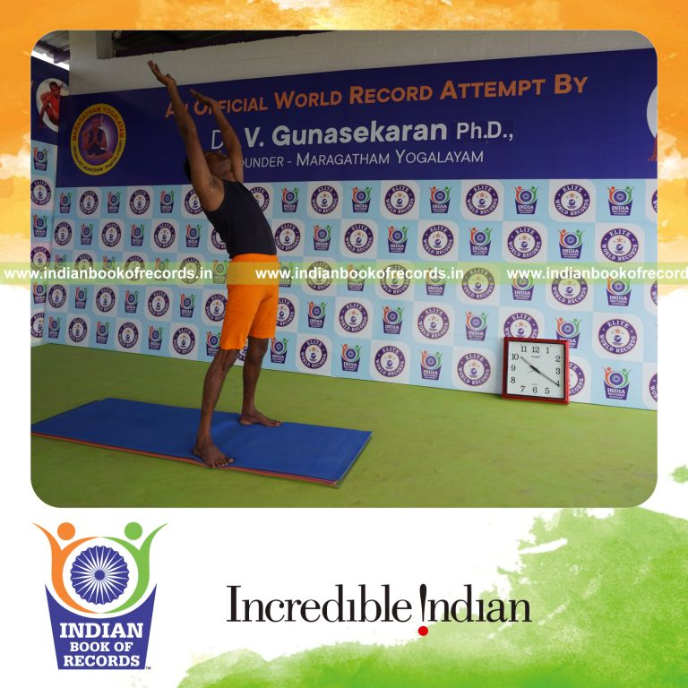 individual holding piraiasana yoga pose for record in Indian Book of Records