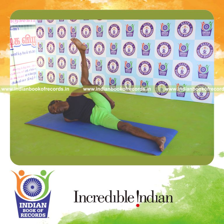 an individual holding vama aananda ardha matsyendrasana yoga pose continuously for the longest duration with flexibility and balance for a record in Indian Book of Records