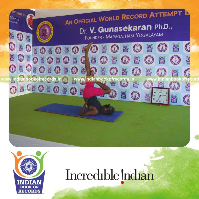 an individual holding vama ardha sarvangasana yoga pose blindfolded for the longest duration with balance and control for a record in Indian Book of Records