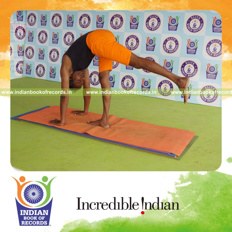 individual holding vama ekapada padahastasana yoga pose for record in Indian Book of Records