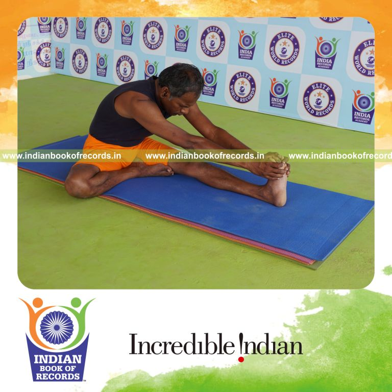 individual holding vama mahamudra yoga pose for record in Indian Book of Records