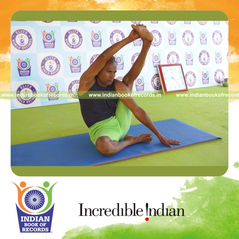 an individual holding vama purna krounchasana yoga pose continuously for the longest duration with flexibility and control for a record in Indian Book of Records