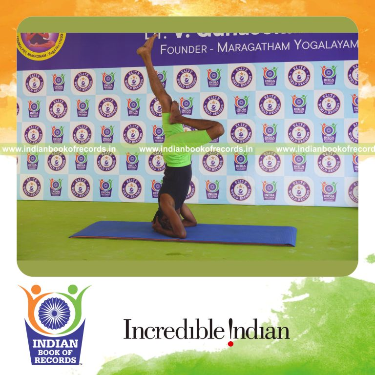 an individual holding the vama ardha sirsasana yoga pose continuously for the longest duration with stability for a record in Indian Book of Records