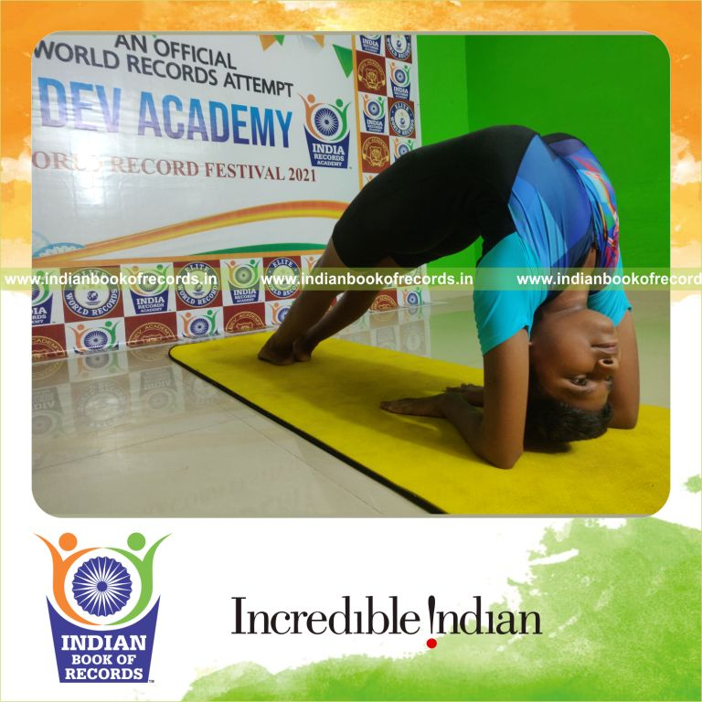 A participant maintaining the Dwi Pada Viparita Dandasana yoga pose steadily for a long time for Indian Book of Records