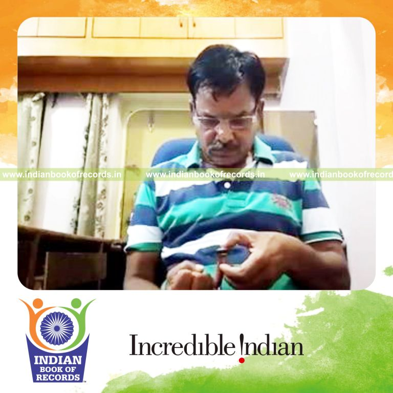 individual spinning fidget spinner on little finger for longest time for record in Indian Book of Records