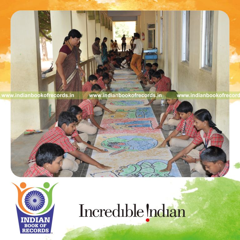 team creating extended finger painting artwork for record in Indian Book of Records