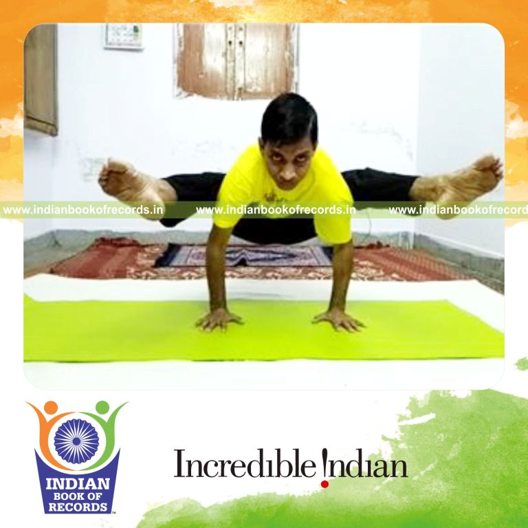 individual holding firefly yoga pose for longest duration for record in Indian Book of Records