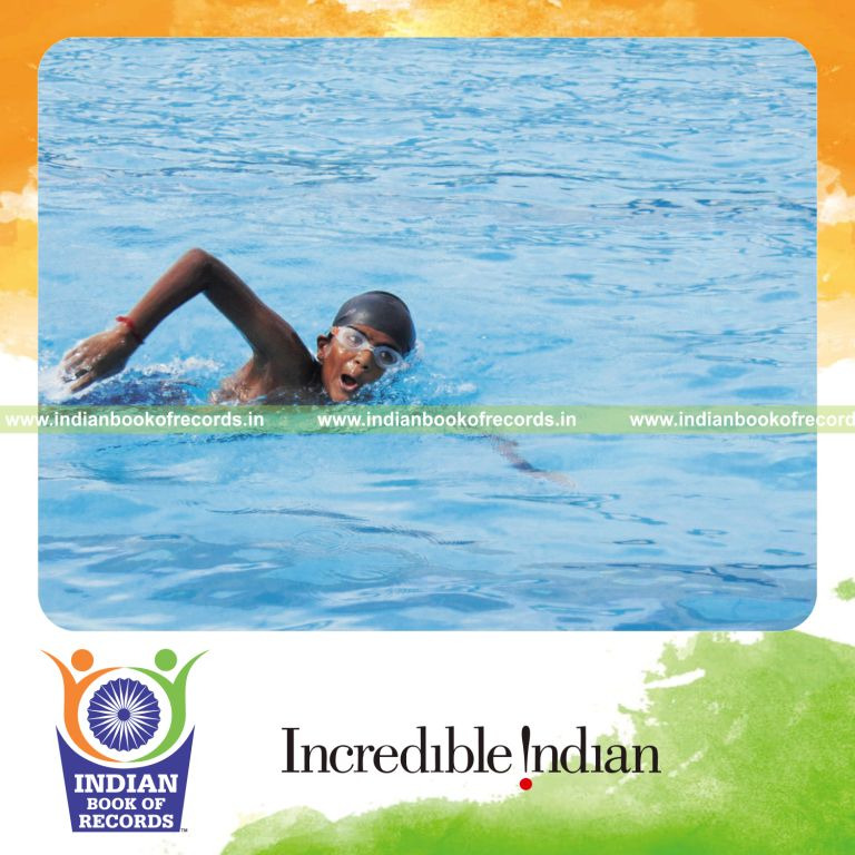 minor male swimming long distance using freestyle technique for Indian Book of Records
