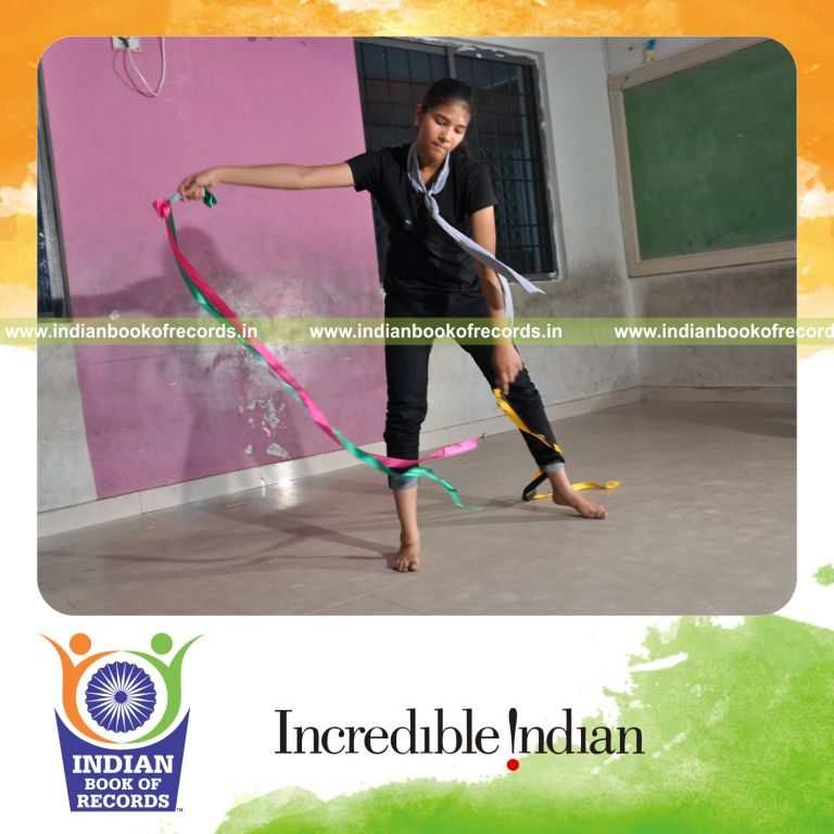 young female performing fusion dance marathon for record in Indian Book of Records