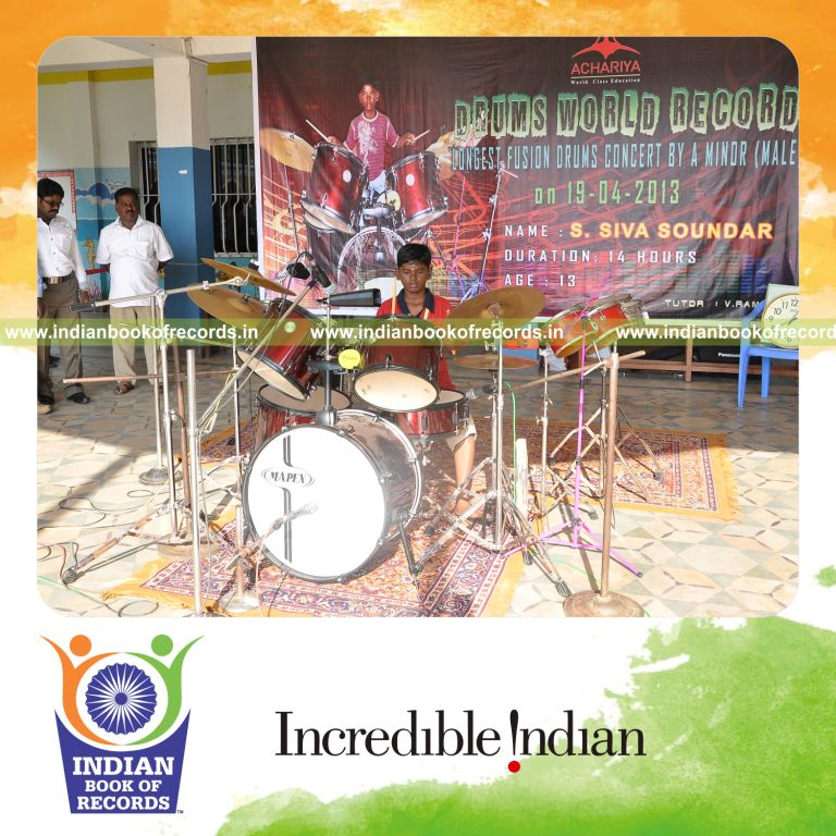 young male performing fusion drums concert for extended duration for record in Indian Book of Records