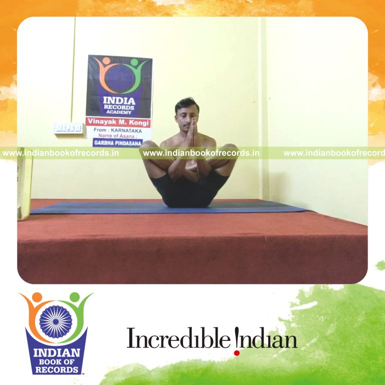 individual male holding garbha pindasana namaskar mudra yoga pose for longest duration for record in Indian Book of Records