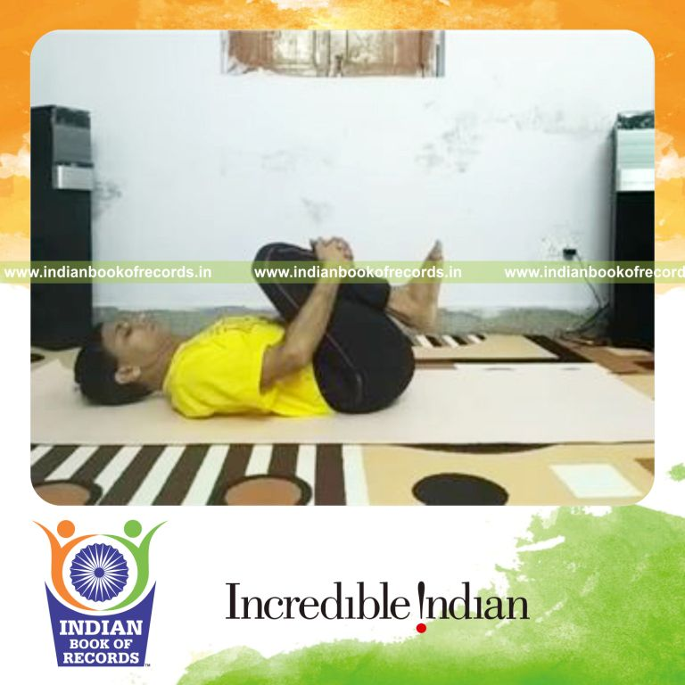 individual holding gas release yoga pose for longest duration for record in Indian Book of Records