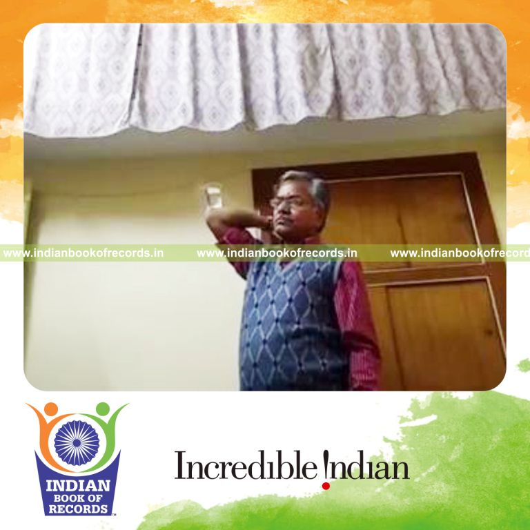 individual balancing glass of water on elbow for longest duration for record in Indian Book of Records