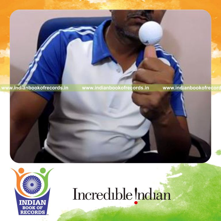 individual balancing golf ball on left thumb for longest duration record in Indian Book of Records