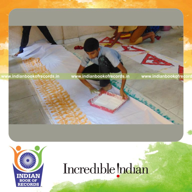 national flag made using handprints by minor male for Indian Book of Records